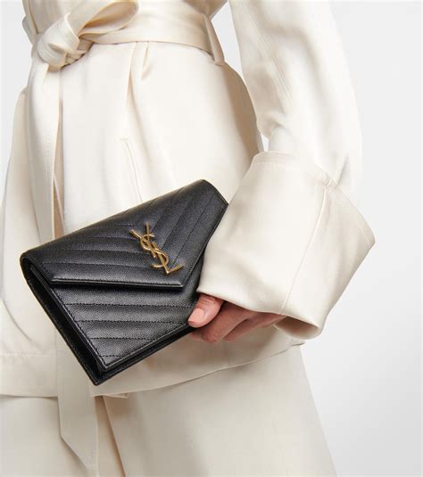 ysl black monogram envelope chain wallet bag|CASSANDRE ENVELOPE CHAIN WALLET IN GRAIN DE .